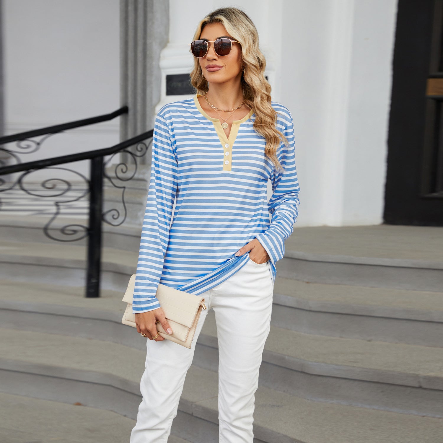 Close-up detail of the soft rayon fabric on our classic Striped V-neck T-shirt, highlighting its premium quality and feel.

