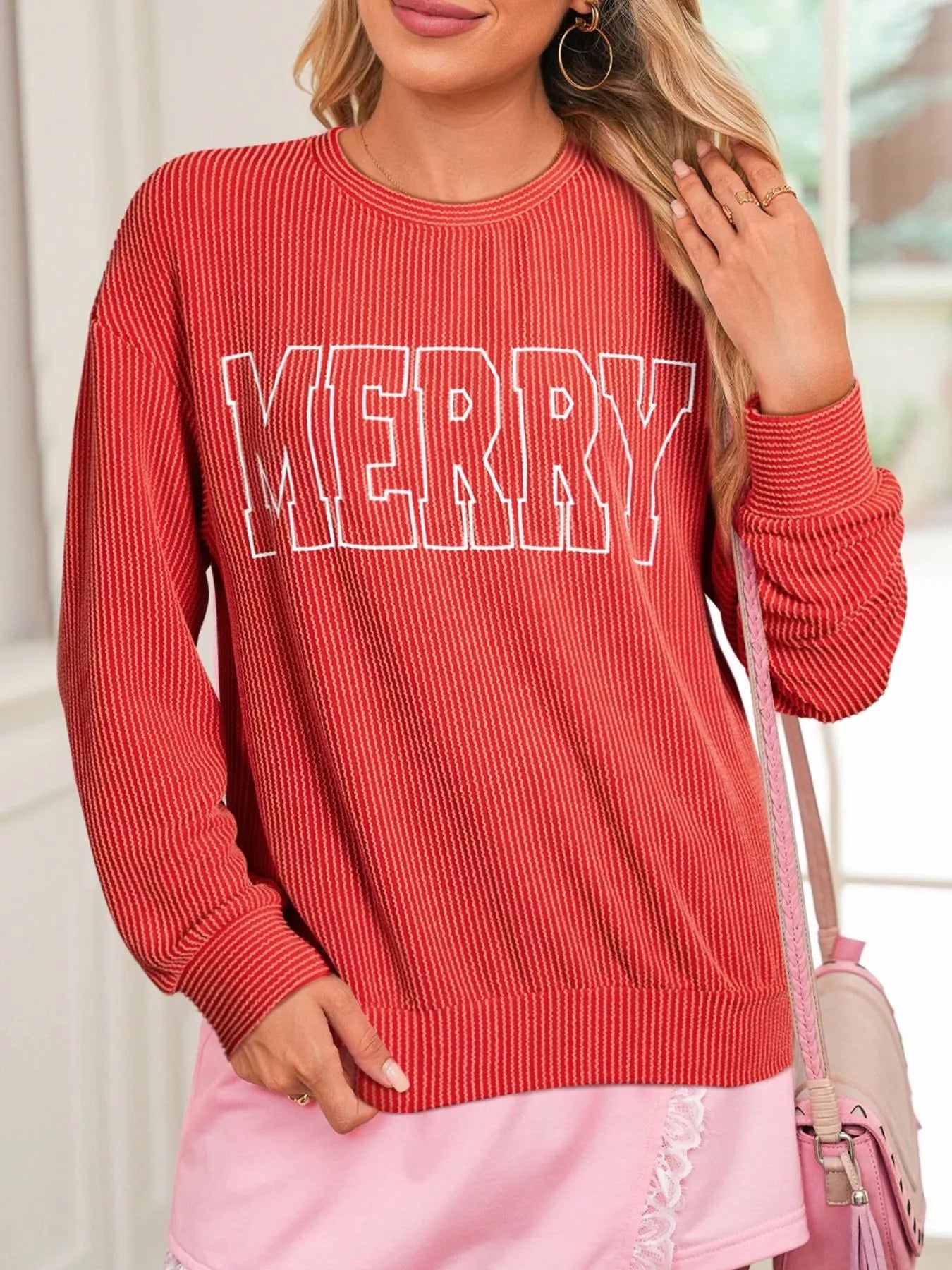 Close-up fabric of ribbed Christmas top – soft viscose blend