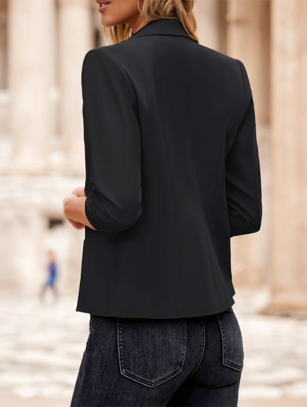 Close-up of 3/4 sleeve detail on polyester blazer

