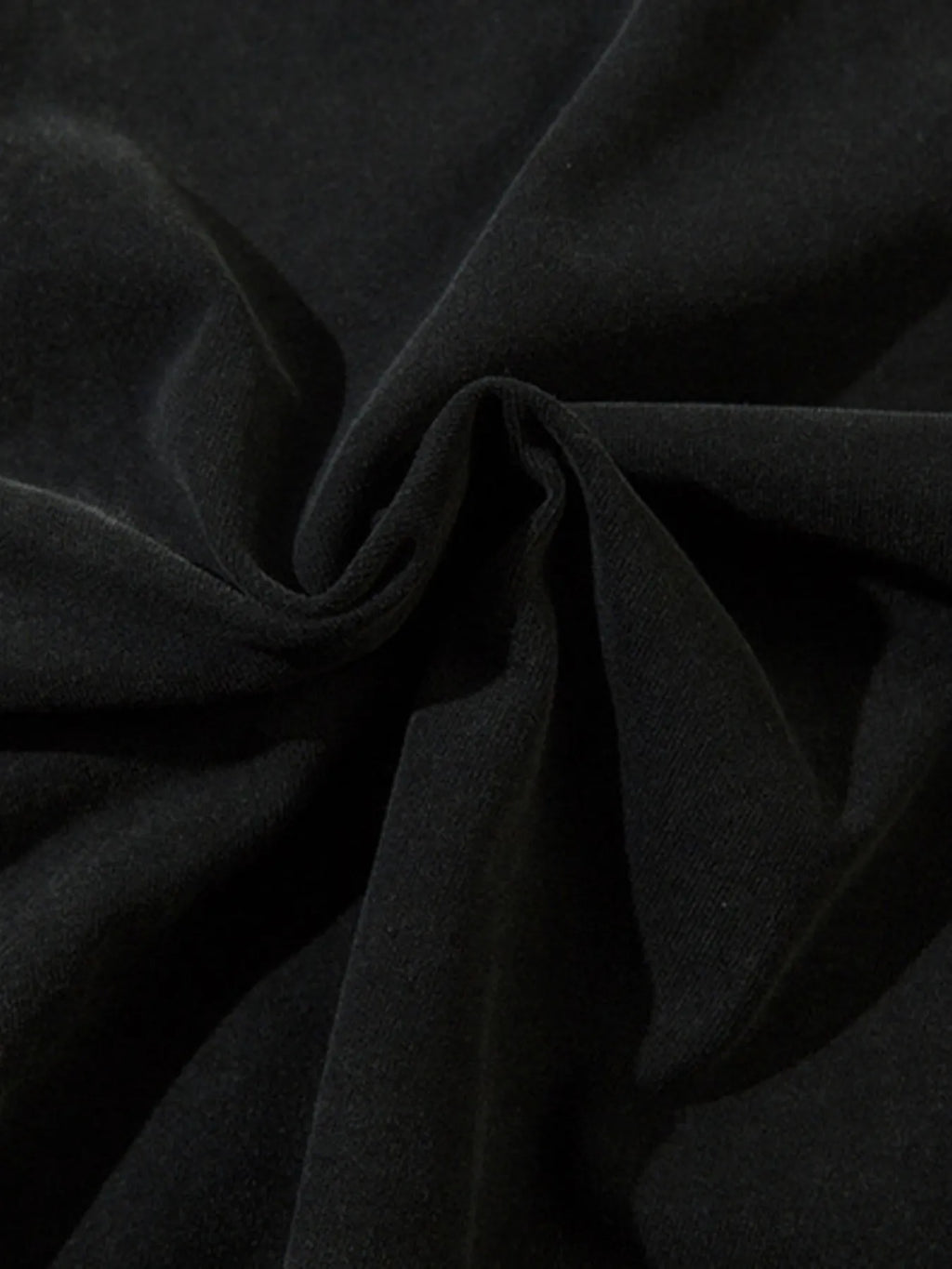 “Close-up of the Men’s Number 88 Round Neck Tee fabric blend label: 96% polyester, 4% cotton”

