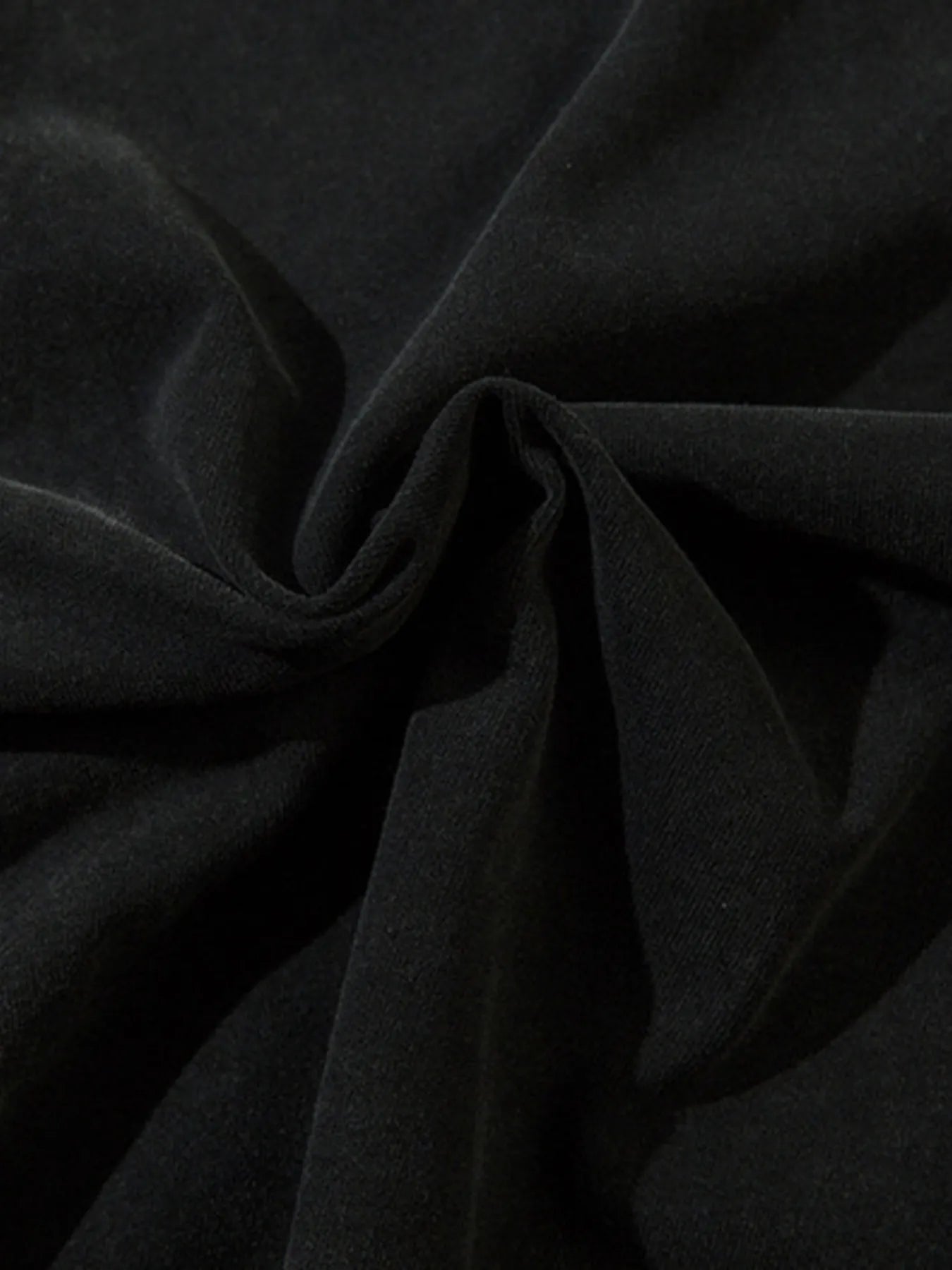 “Close-up of the Men’s Number 88 Round Neck Tee fabric blend label: 96% polyester, 4% cotton”


