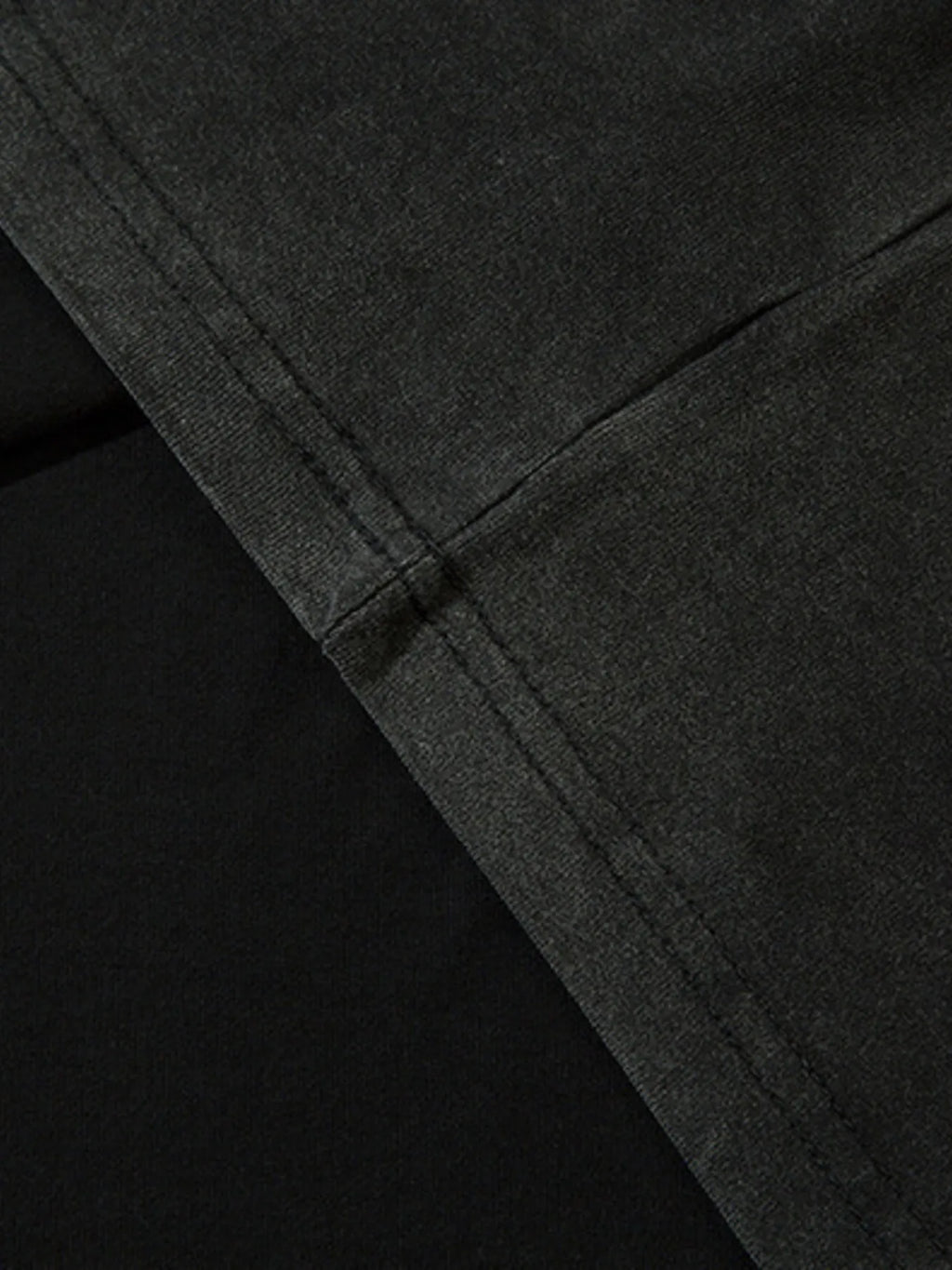 Close-up of the reinforced hem and stitching detail.

