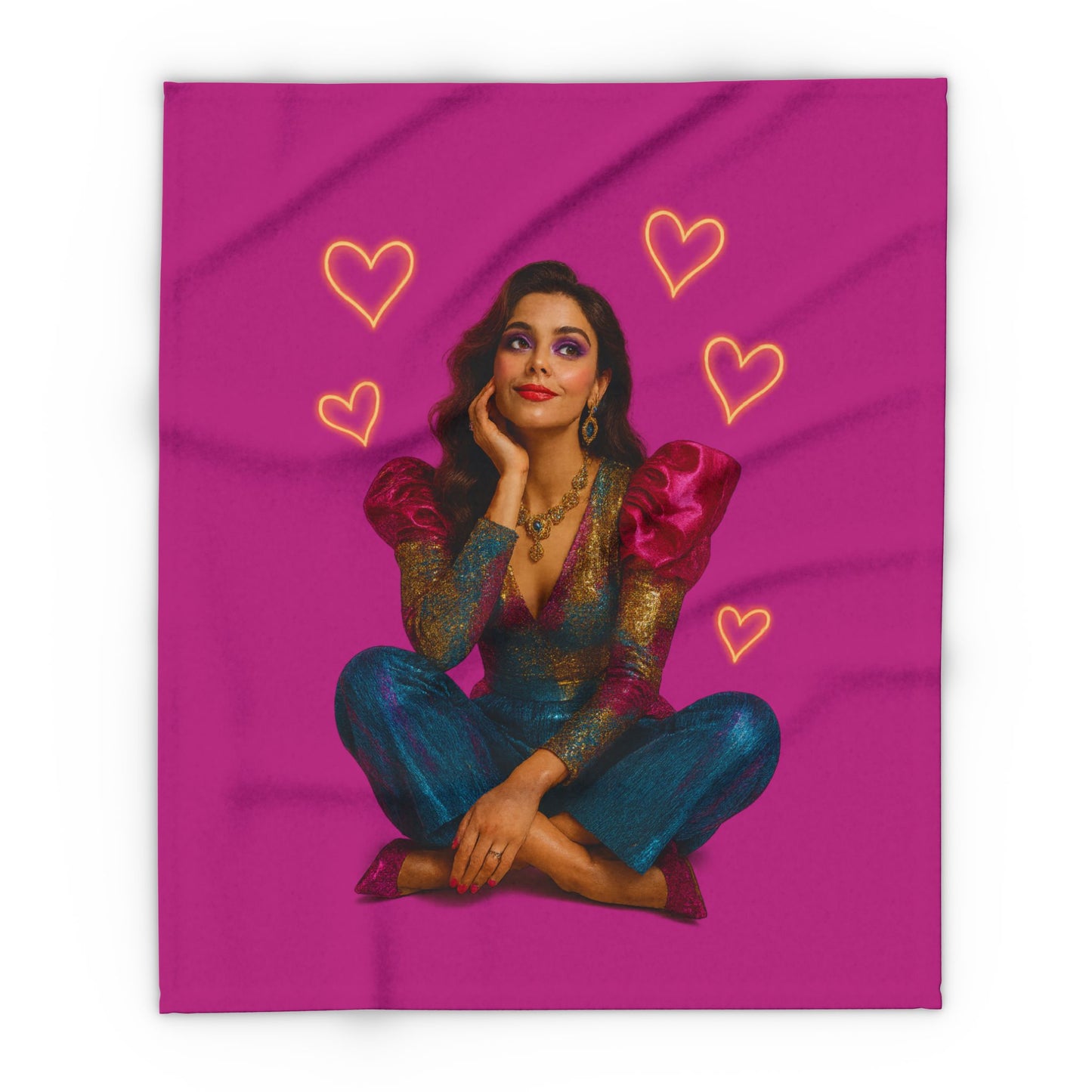 Cozy reading nook featuring our Arctic Fleece Blanket and candles

