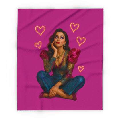 Cozy reading nook featuring our Arctic Fleece Blanket and candles

