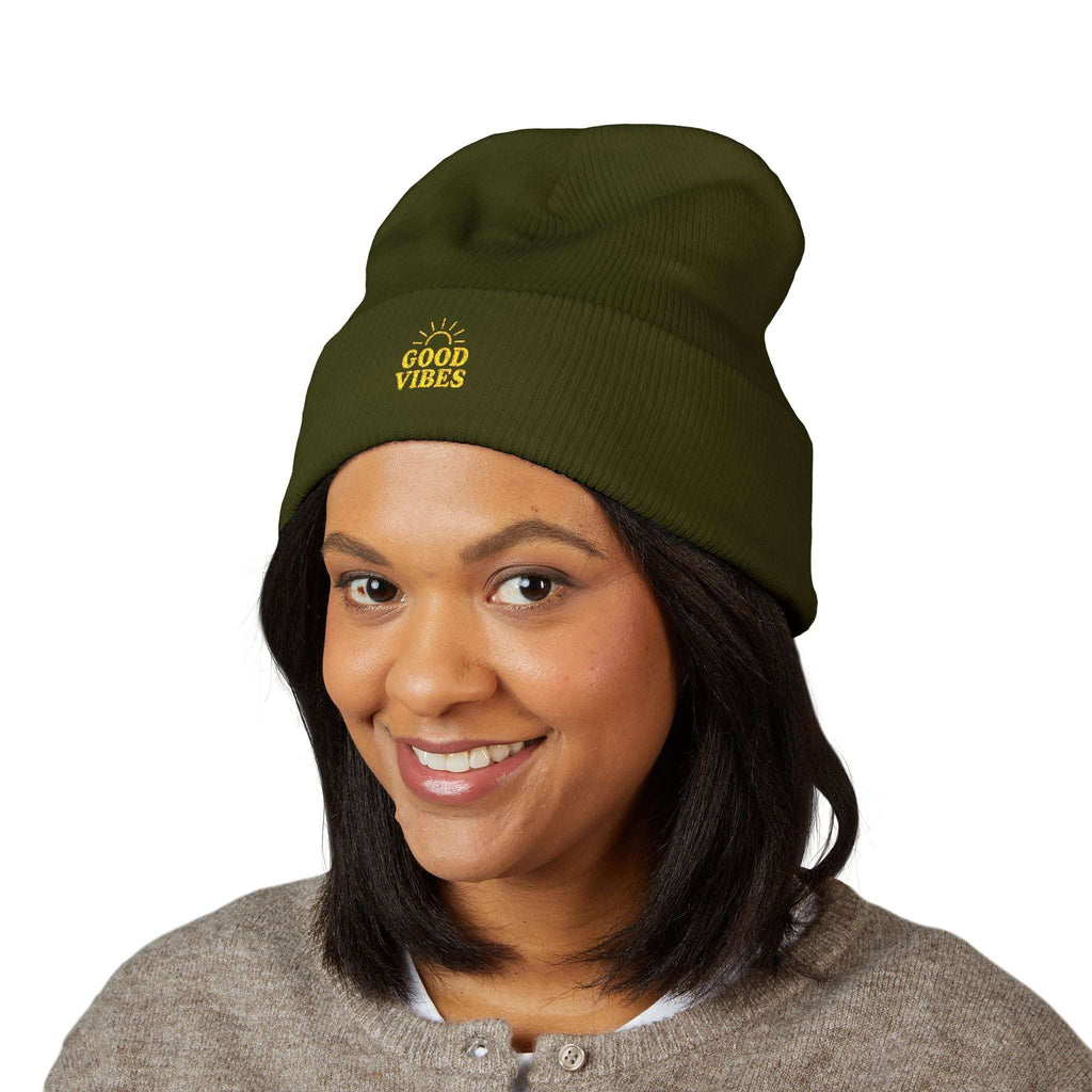 Embroidered knit cap shown with festive winter outfit

