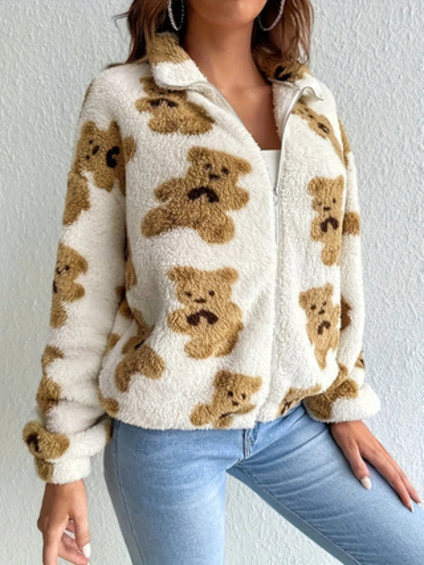Cute & cozy commute – bear print fleece jacket styled with beanie