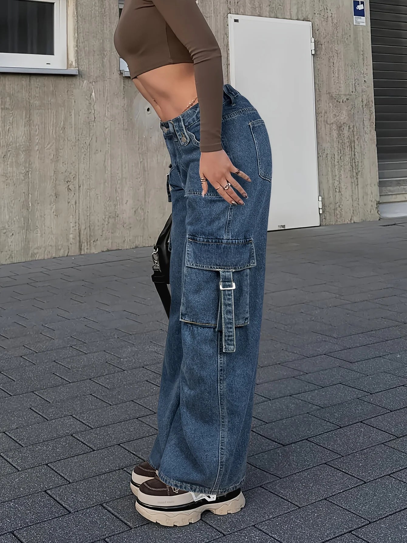 Detail Shot of Button Fly and Washed Denim in Trendy Women's Cargo Jeans