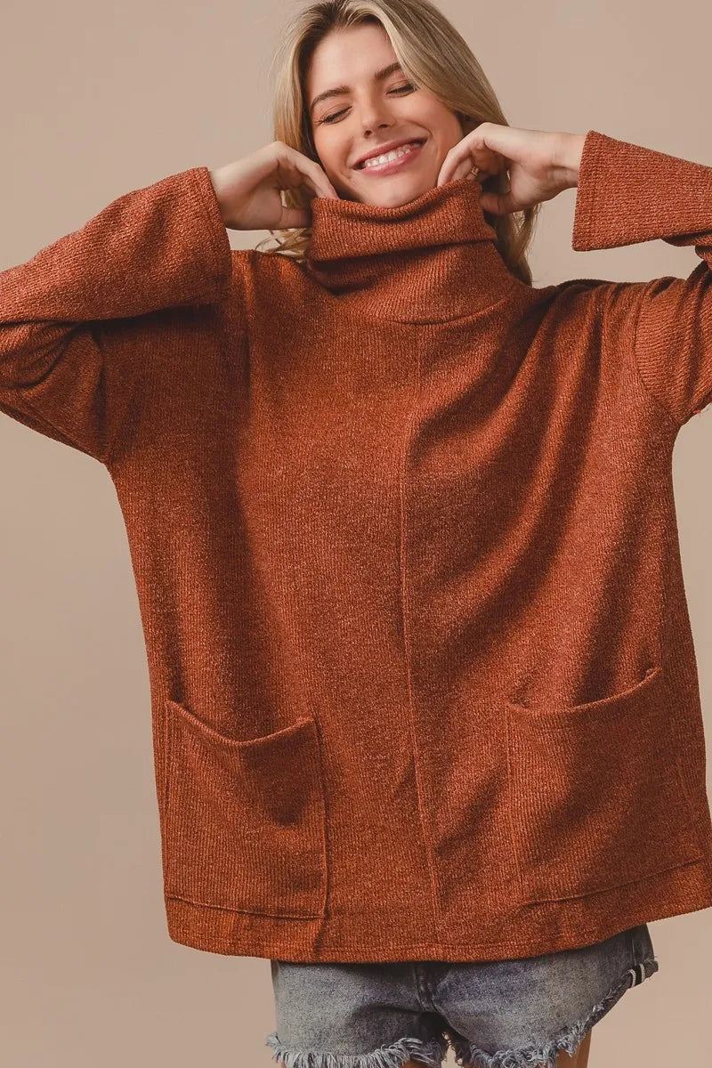 Detail of cozy fold-over turtle neck on the Rib Double Pocket Turtle Neck Top

