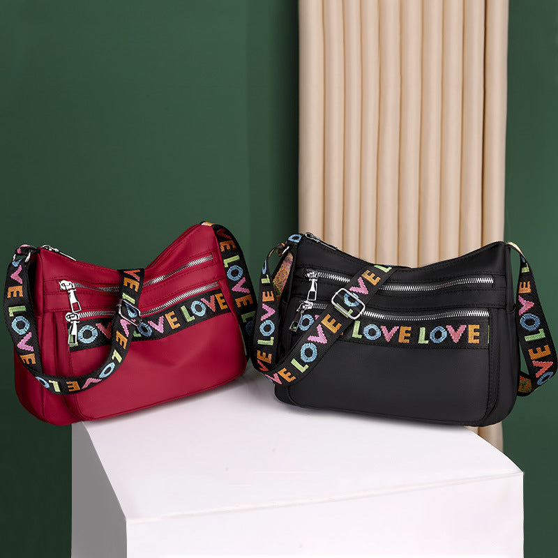 Durable Black Oxford Cloth Crossbody Bag: Multi-Pocket Design for Essentials