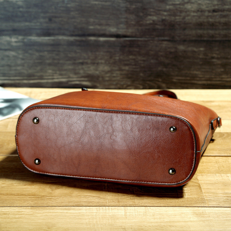 Durable Leather Handbag with Multiple Inner Compartments