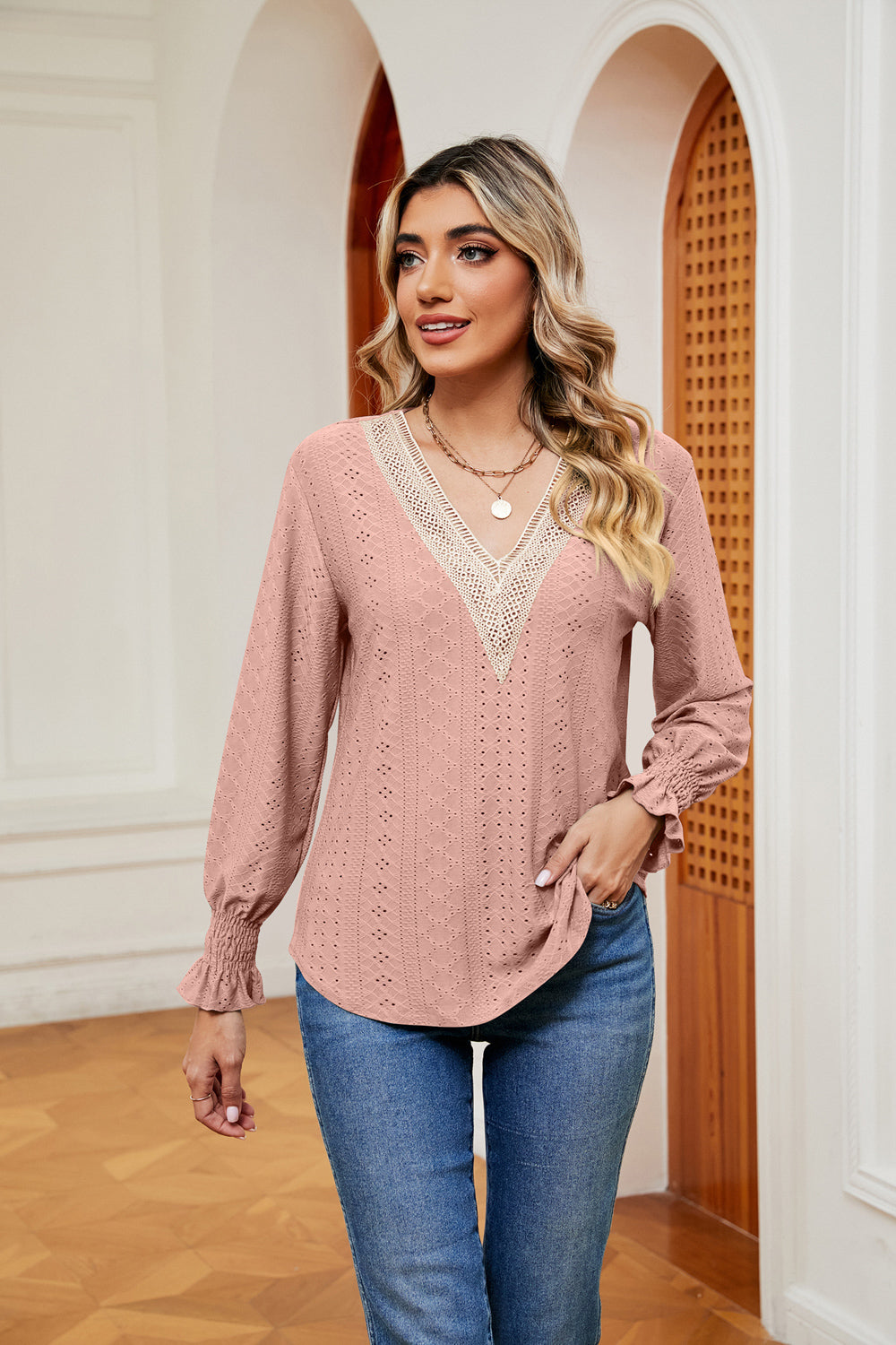 “Elegant women’s blouse with contrasting flounce sleeves, soft and slightly stretchy, perfect for office or evening wear.”







