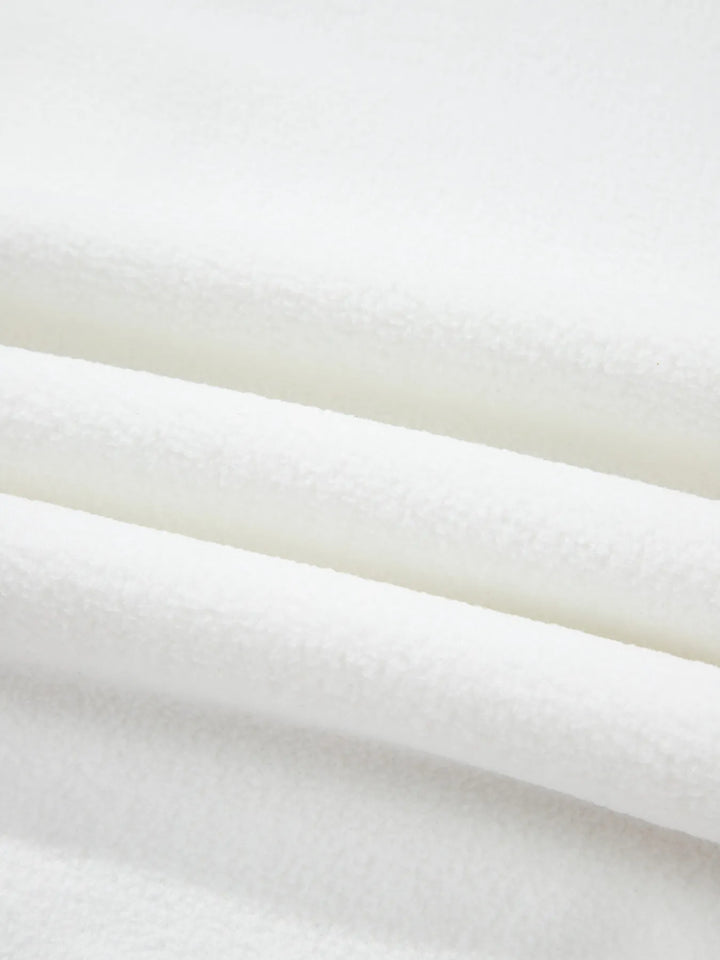 Exposed seam long sleeve top in durable polyester blend

