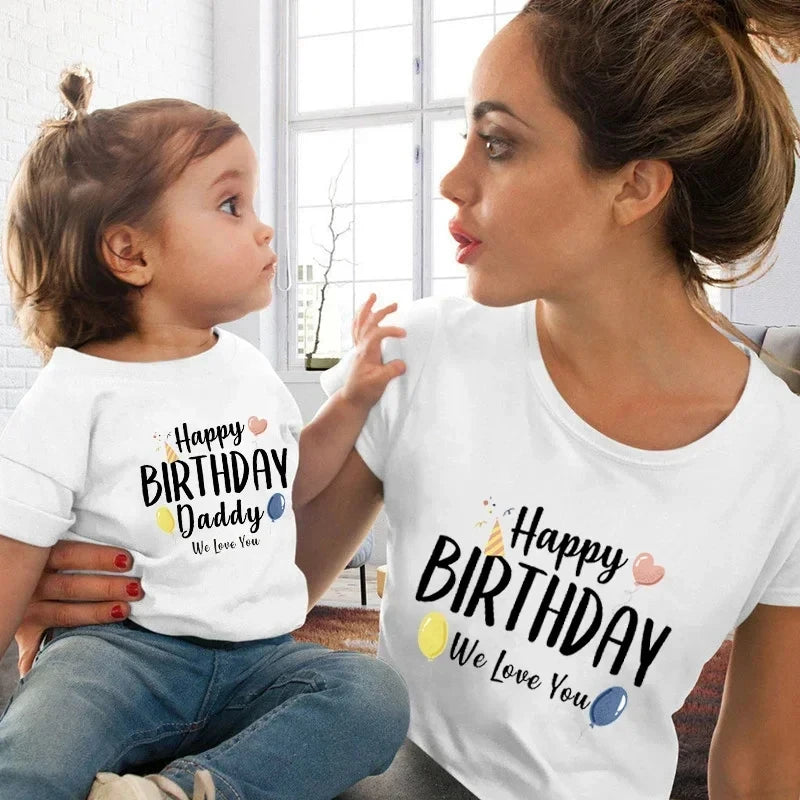 Family pose in Happy Birthday Daddy shirt set – birthday photo-ready look