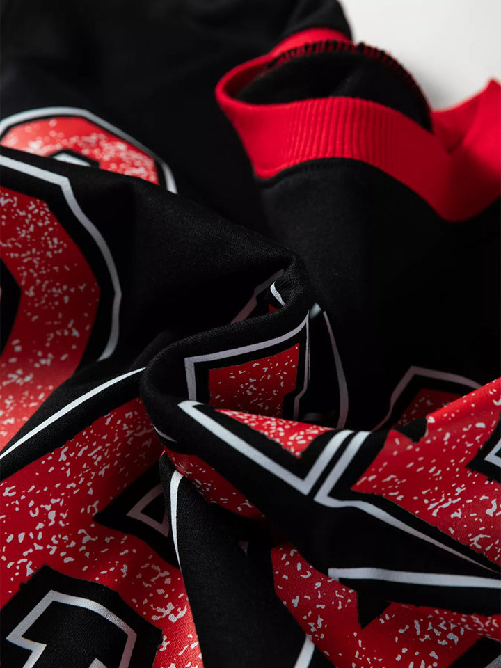 Fan-ready pose in baggy Game Day Striped Detail Women&