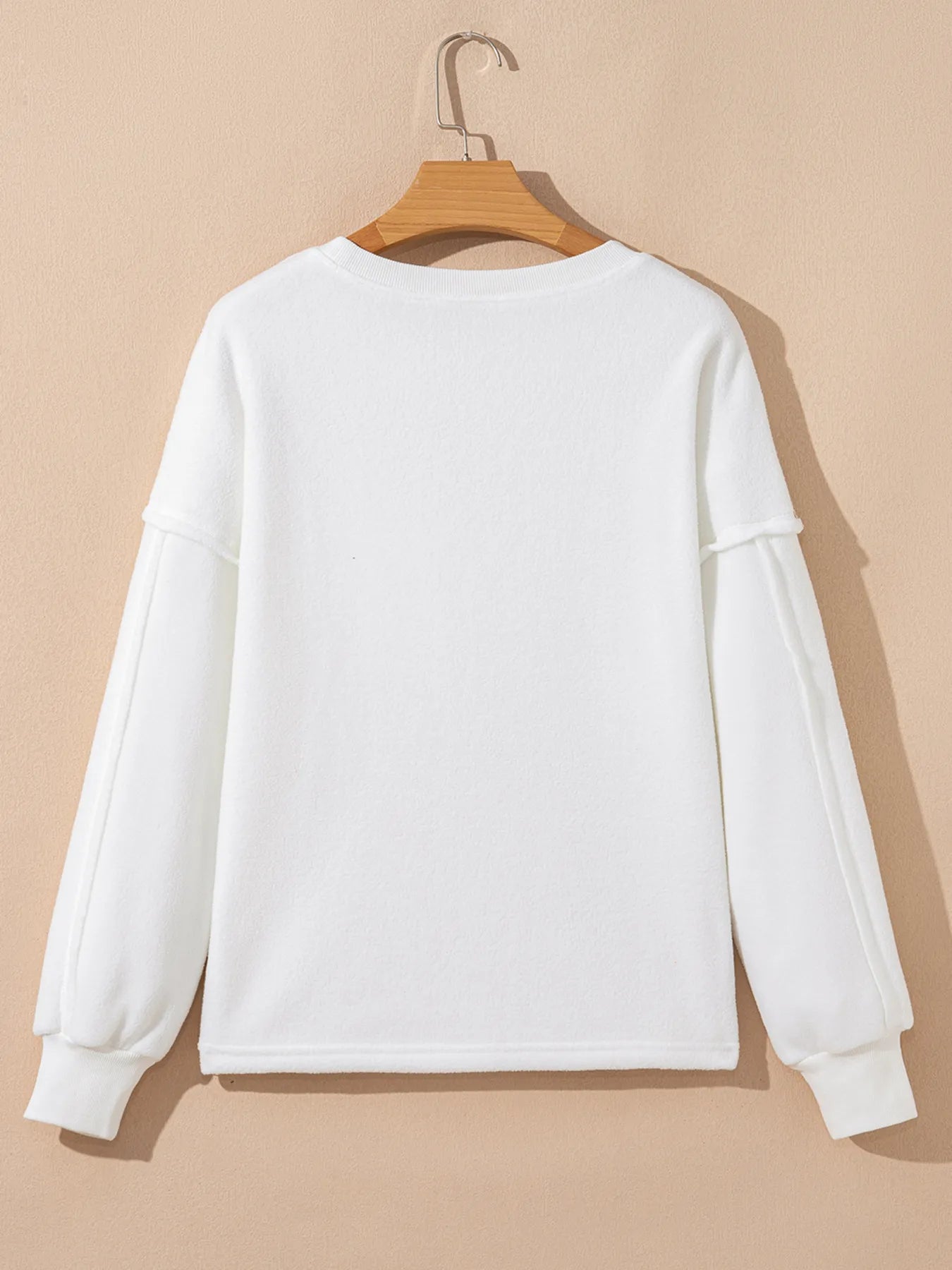 Fashion-forward women’s top with functional side pockets

