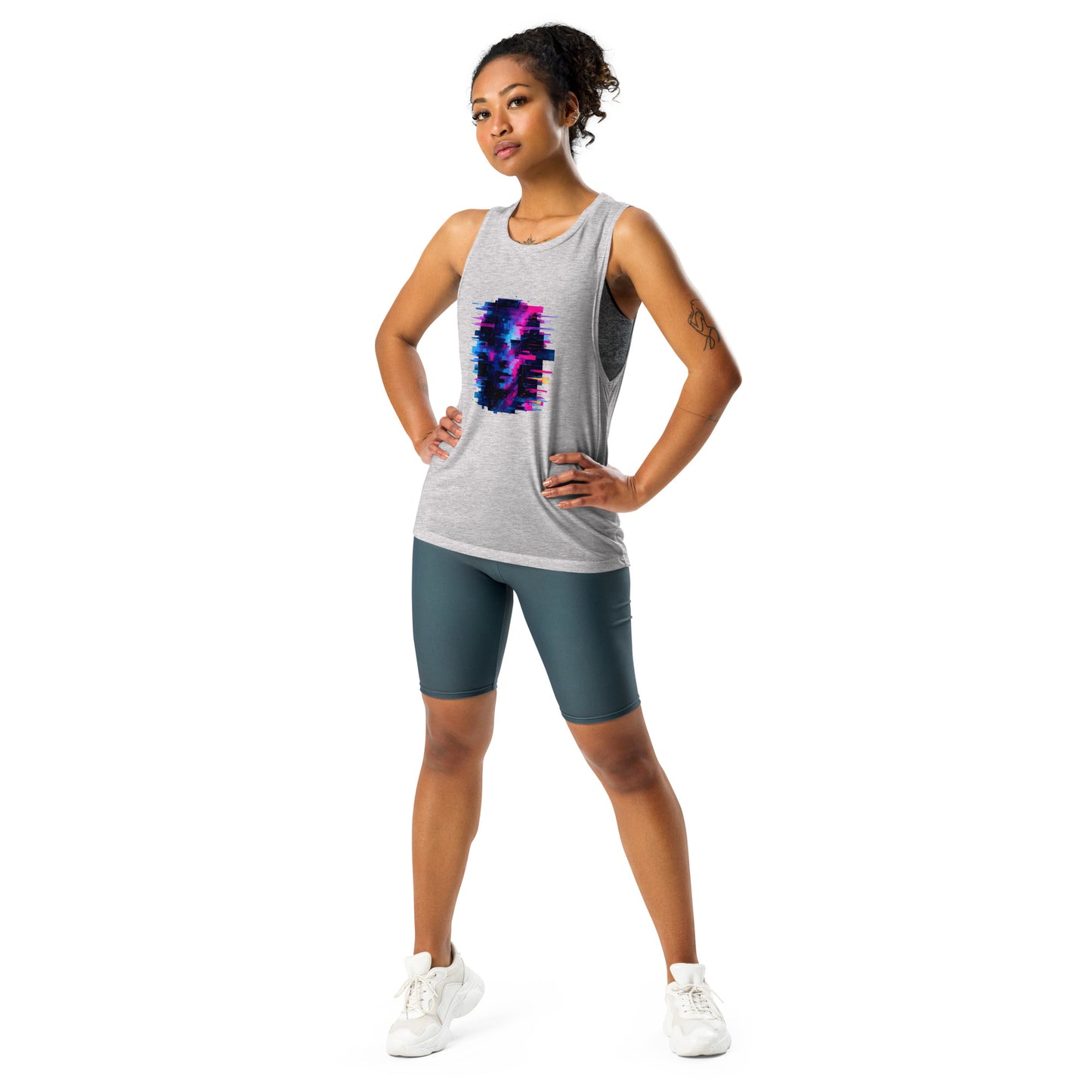 Flat-lay of ladies’ muscle tank with earbuds and water bottle ready for training or casual errands.
