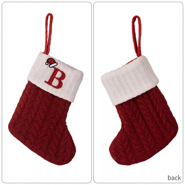Flat Lay of Cable-Knit Contrast Christmas Stockings and Gifts