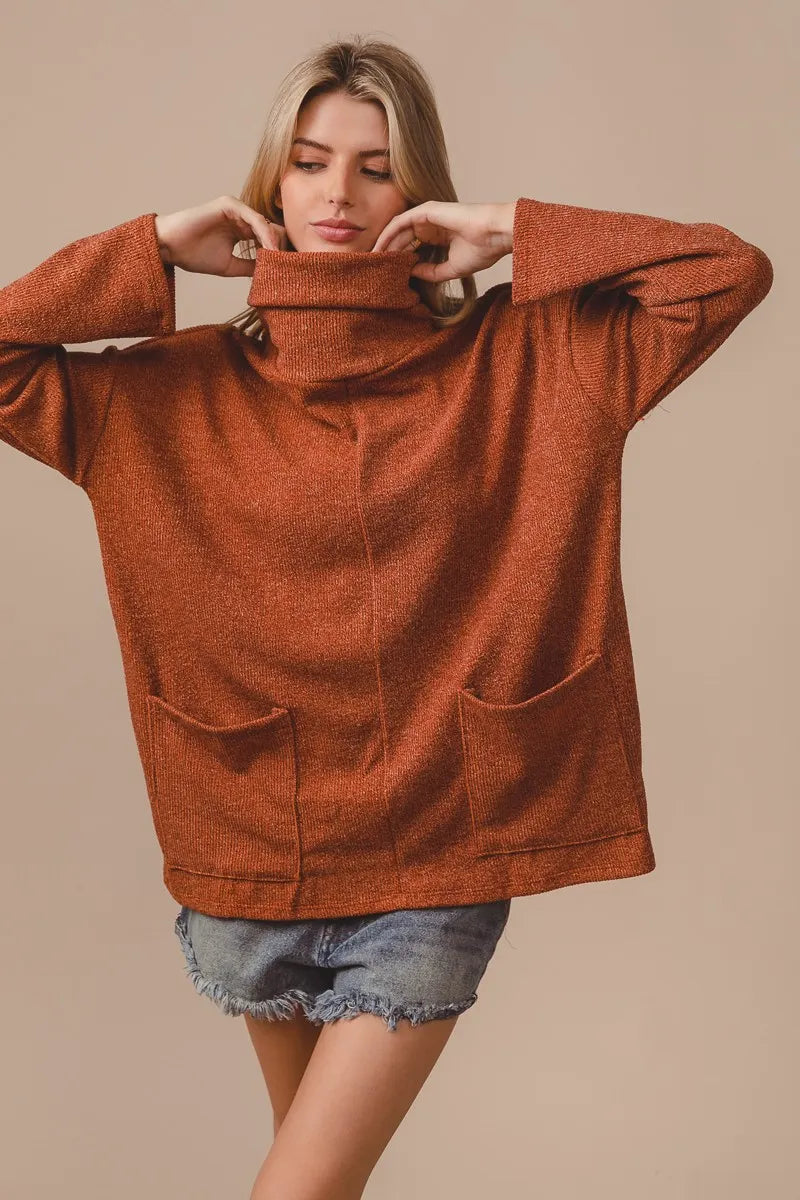 Flat lay: Rib Double Pocket Turtle Neck Top, accessories, and winter styling