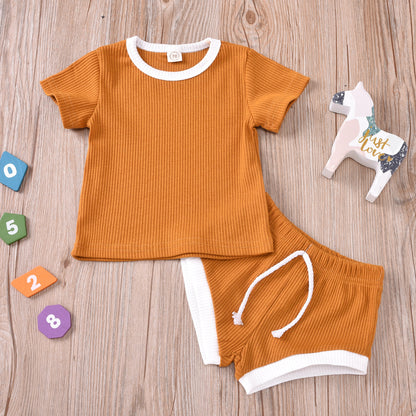 Group shot of various sizes in the infant two-piece set for growing toddlers.