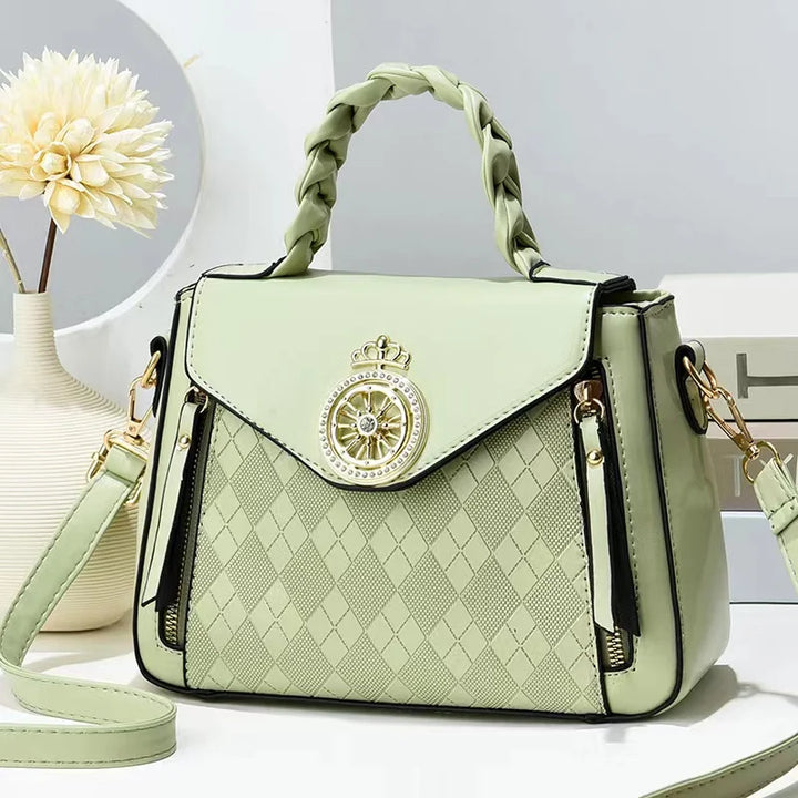 Blue PU handbag with zipper closure and single strap displayed to show the tote shape and everyday carry design online style.