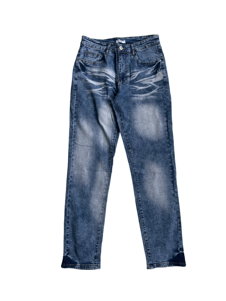Full front flat lay of blue washed jeans with belt loops, front button, coin pocket, curved whisker fading and stitched hems.