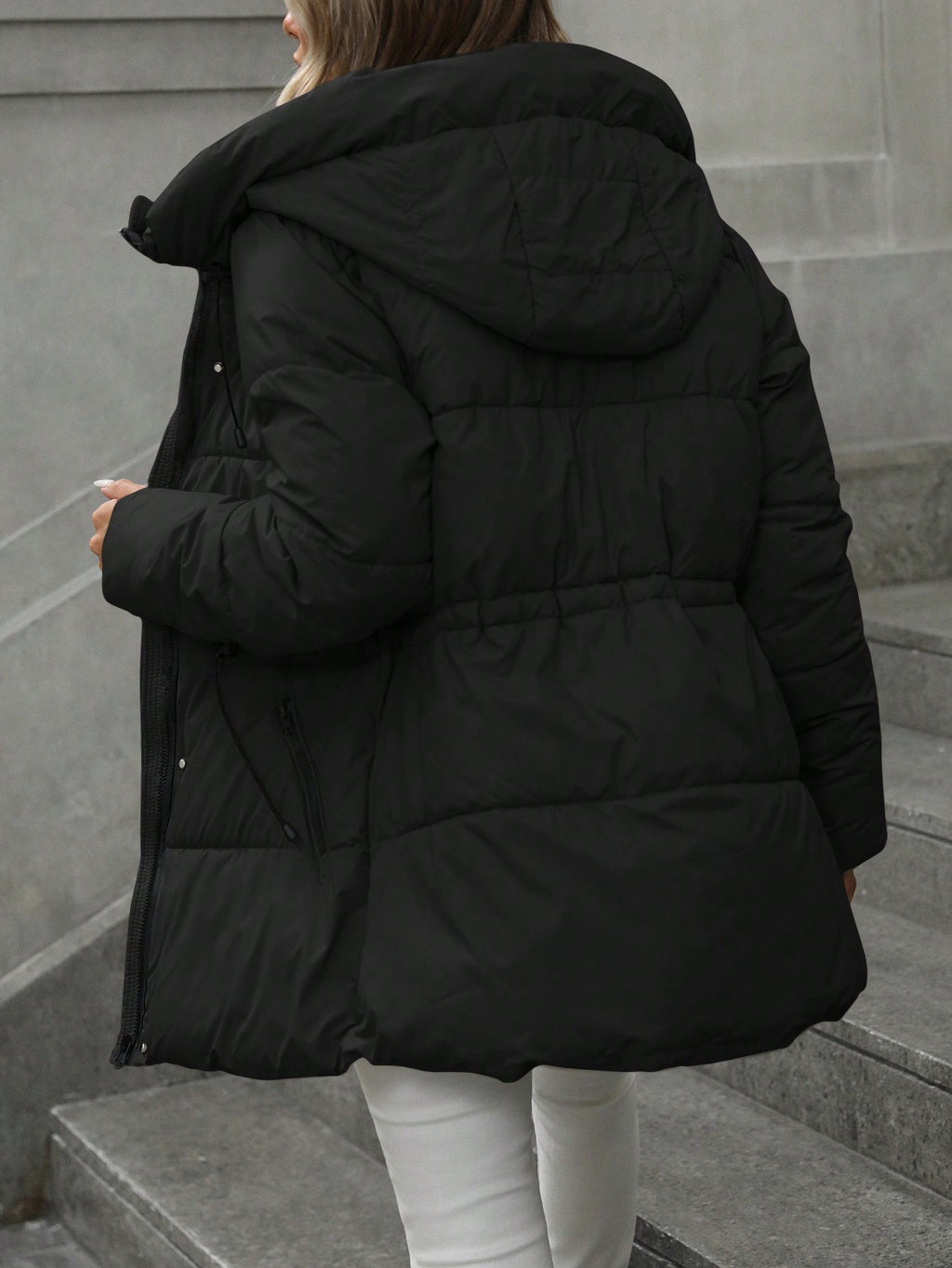 “Hands-in-pockets stance, demonstrating deep, fleece-lined side pockets for cozy storage.”

