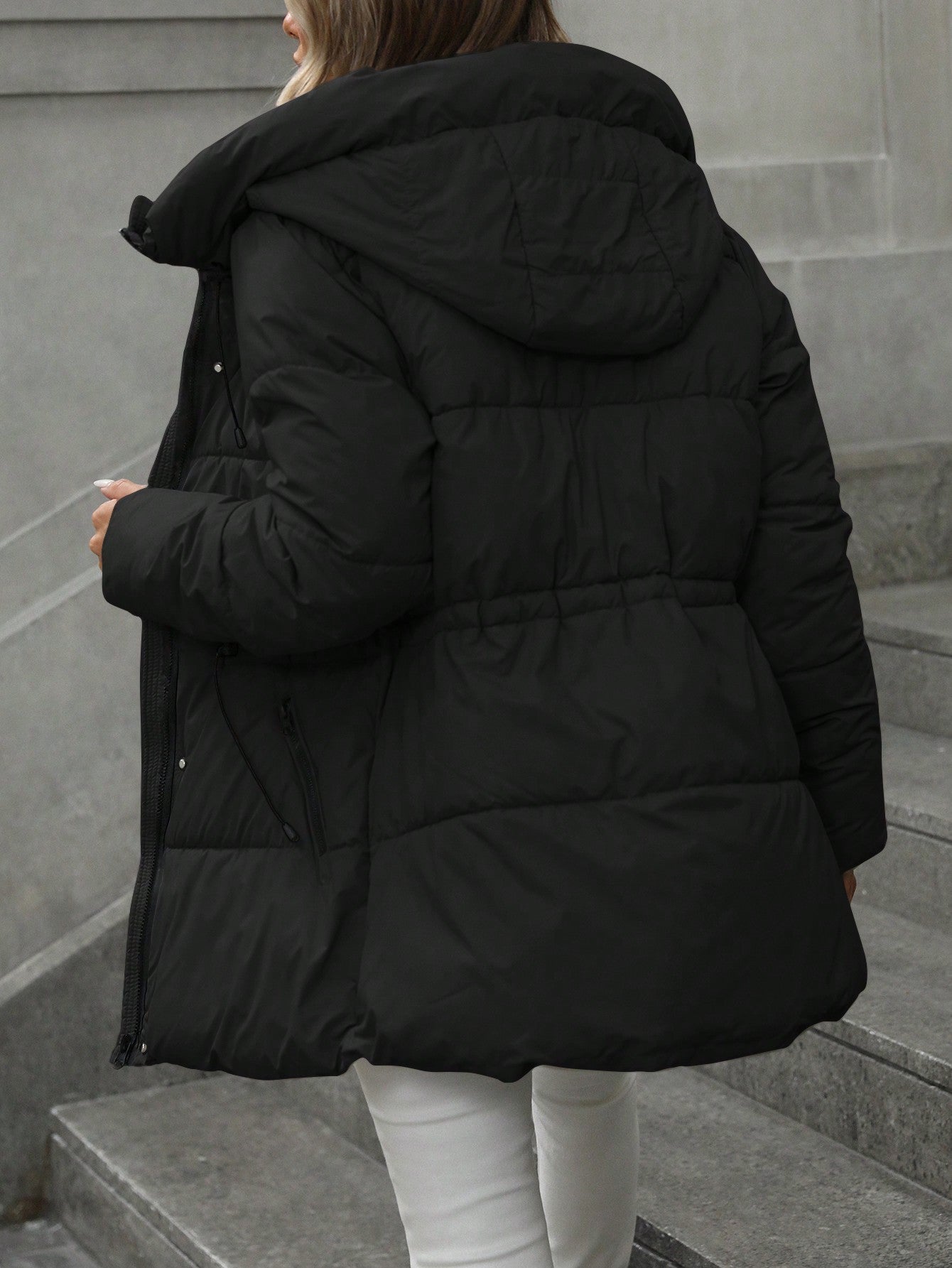 “Hands-in-pockets stance, demonstrating deep, fleece-lined side pockets for cozy storage.”


