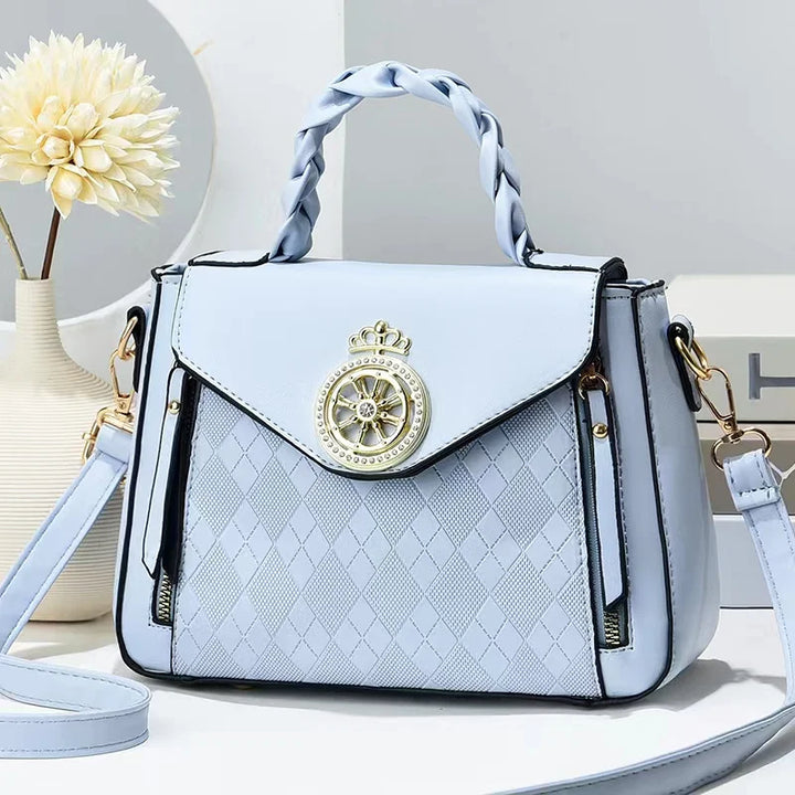 Pink PU handbag with single shoulder strap and zipper closure shown in a clear product view for daily styling view wear look.