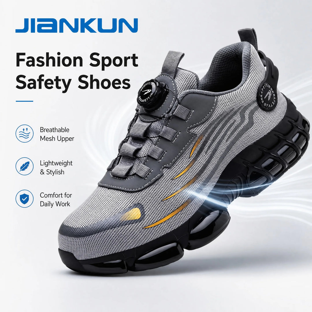 Grey athletic steel toe safety shoe with a fly-knit mesh upper and black sculpted outsole.
