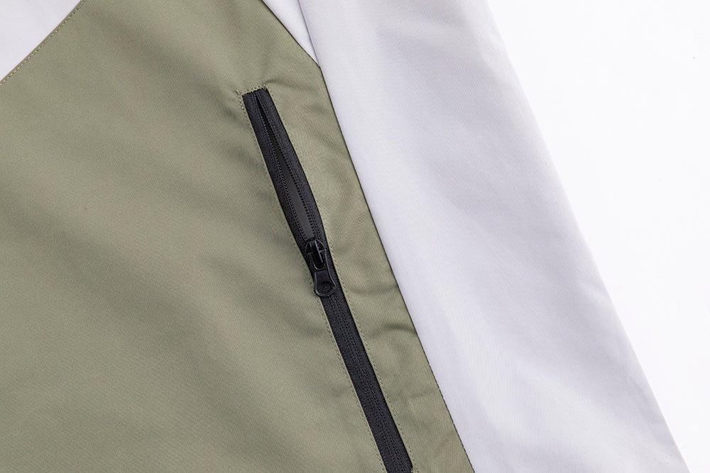 High-altitude bivouac scene showcasing mountaineering assault suit

