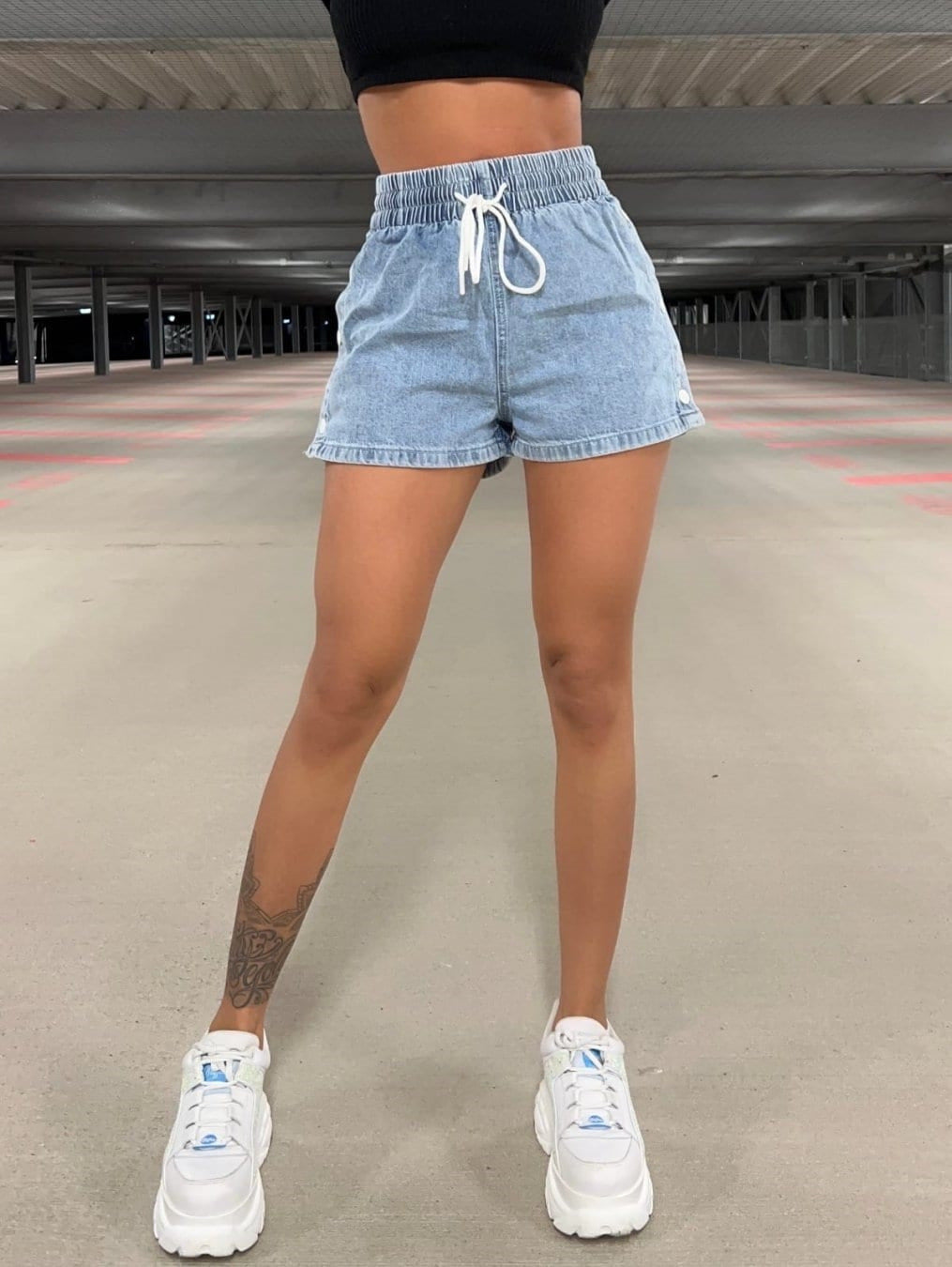 High waist women’s denim shorts styled with blazer and flats
