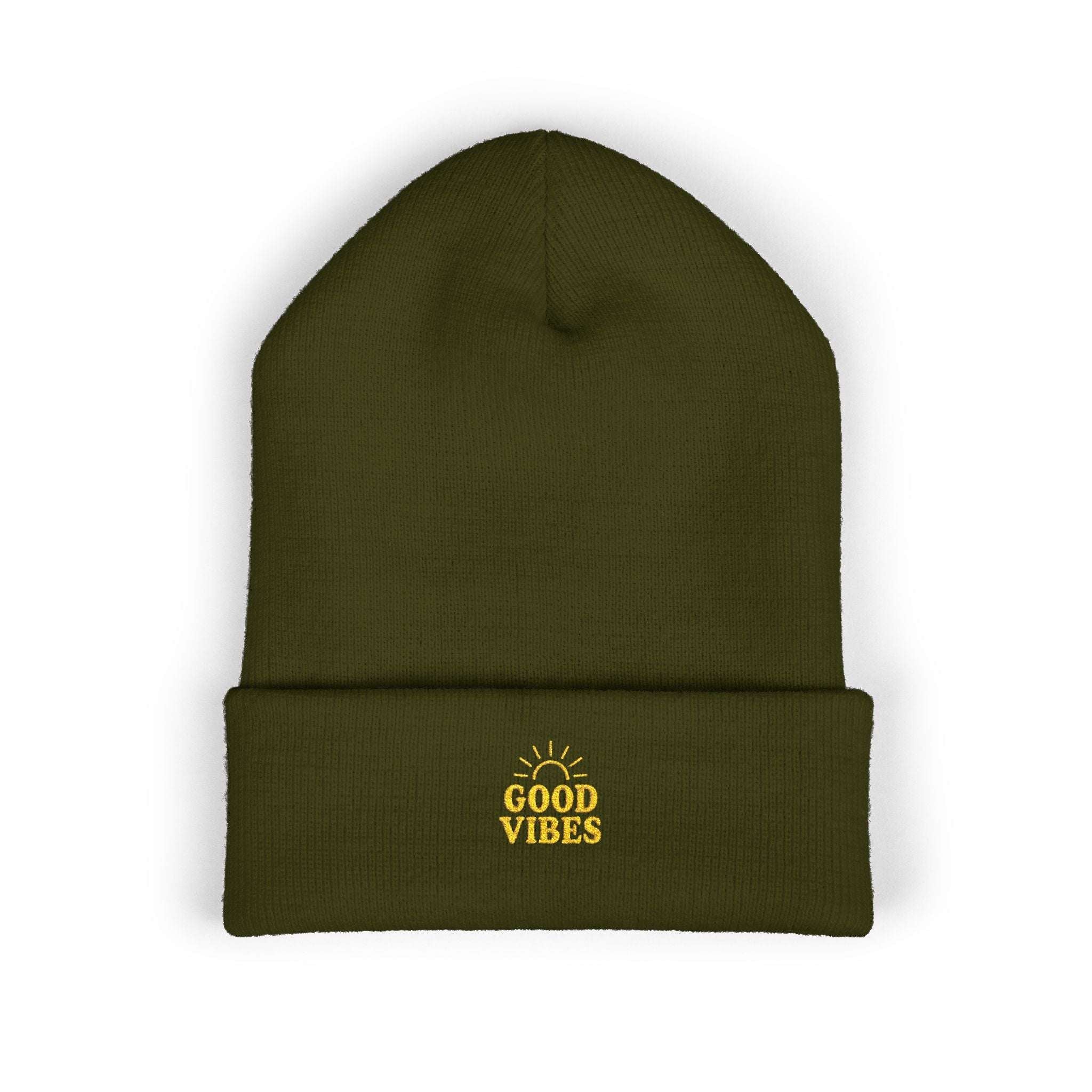Close-up of embroidery detail on warm cuffed winter beanie

