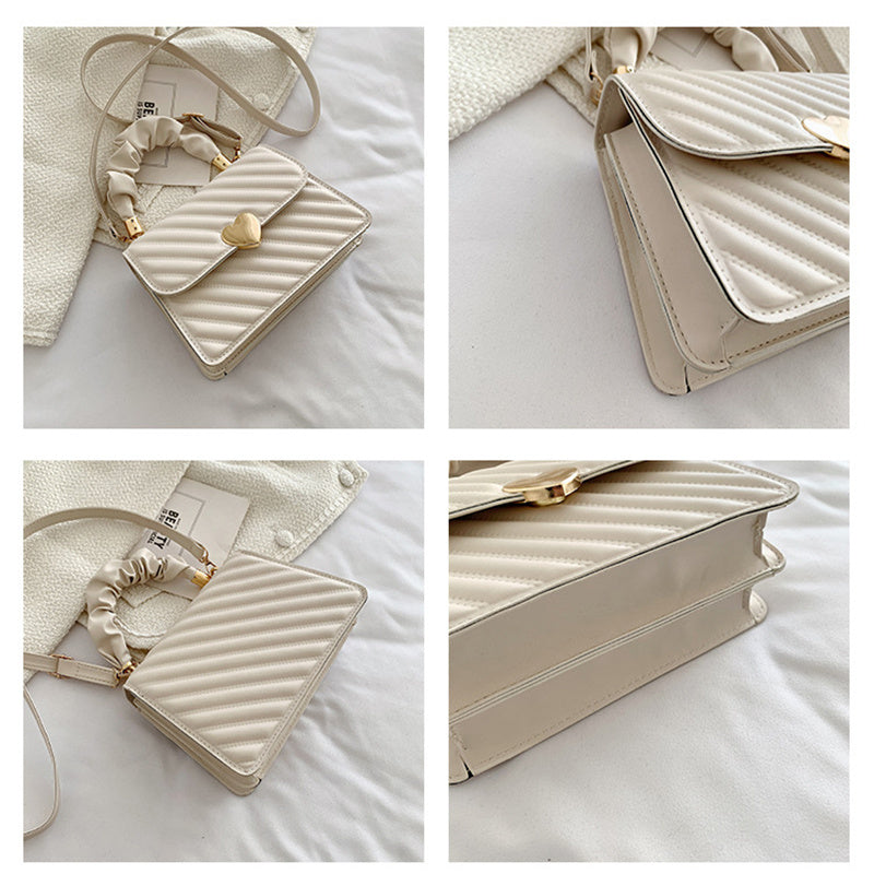 Interior of women’s chain shoulder bag – phone sleeve