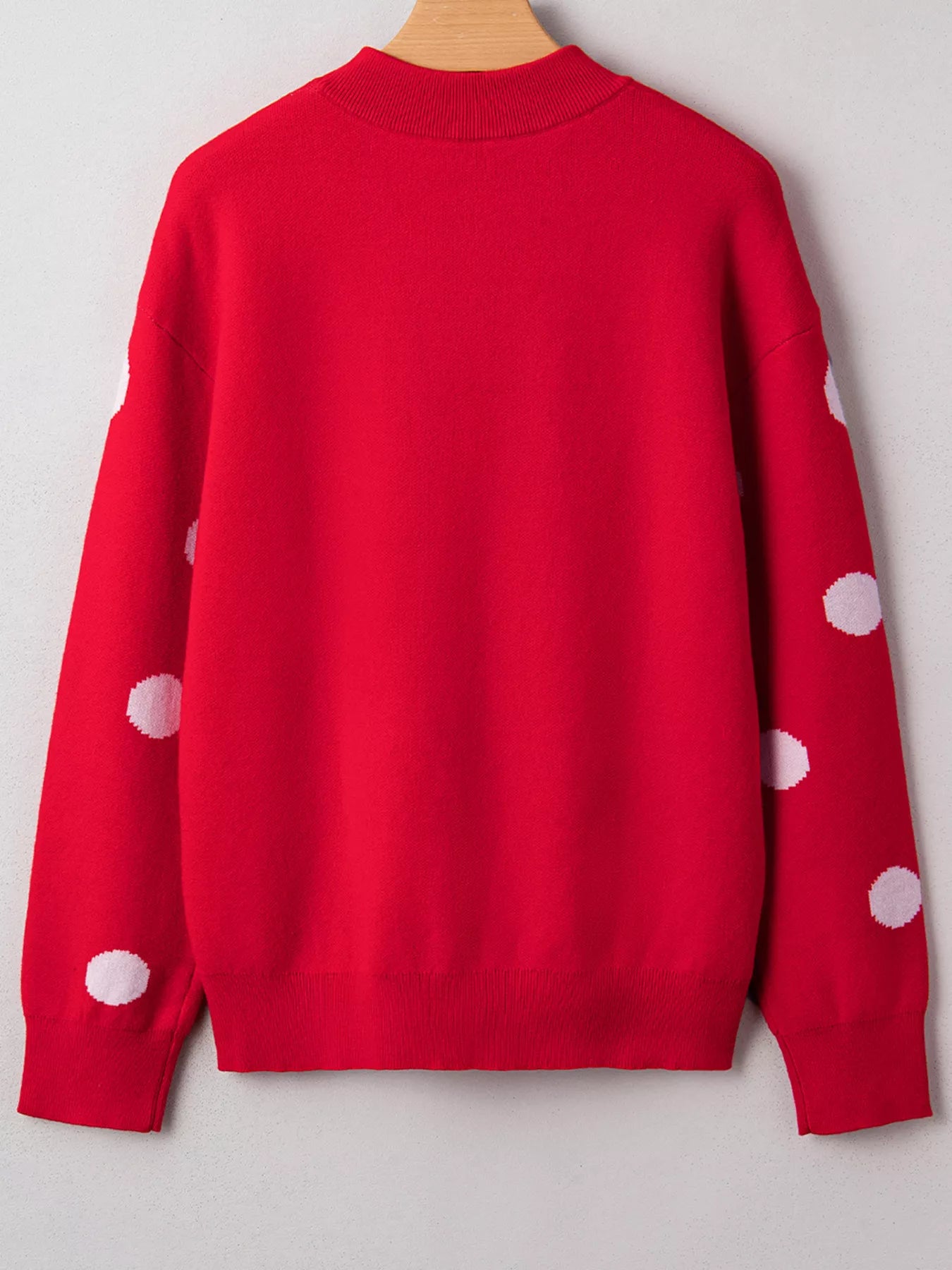 Let It Snow Christmas sweater ribbed cuffs and relaxed silhouette