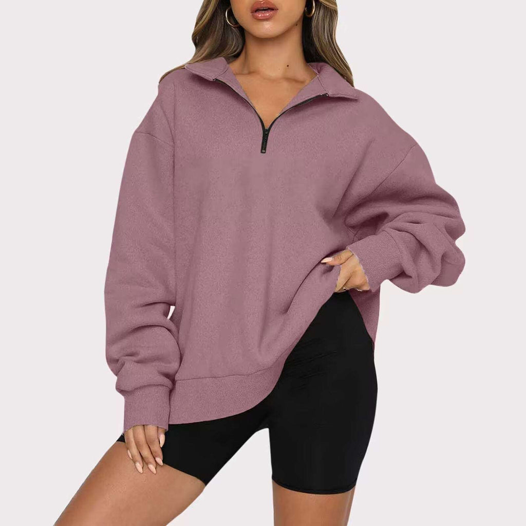 Dark gray women's zip collar sweatshirt on white surface, regular sleeves and zip detail

