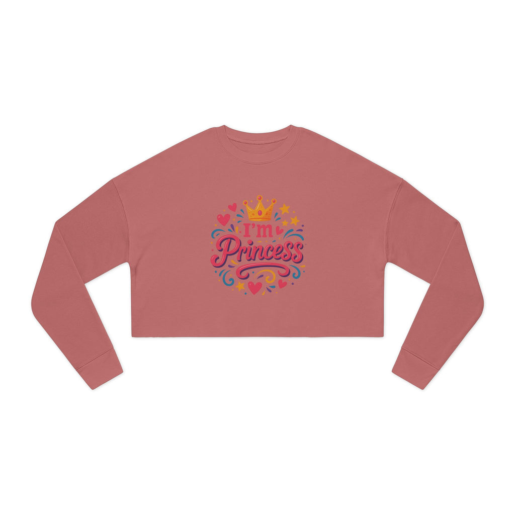 Meticulously designed cropped sweatshirt worn with a gold pendant and denim


