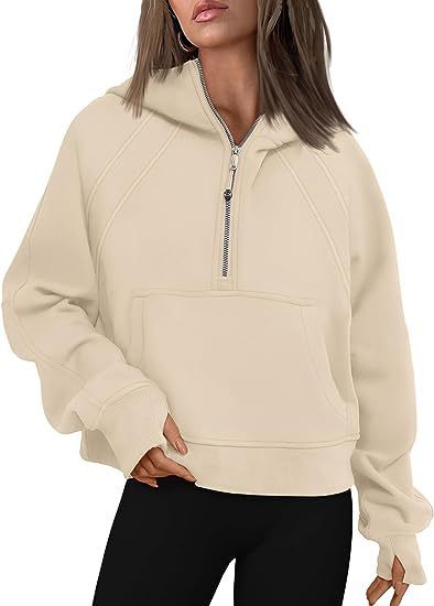 Light gray hoodie with zipper and pocket, perfect for layering

