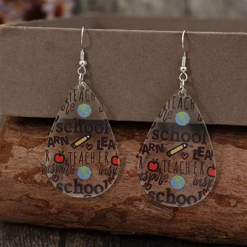 Acrylic teardrop earrings modeled with casual outfit

