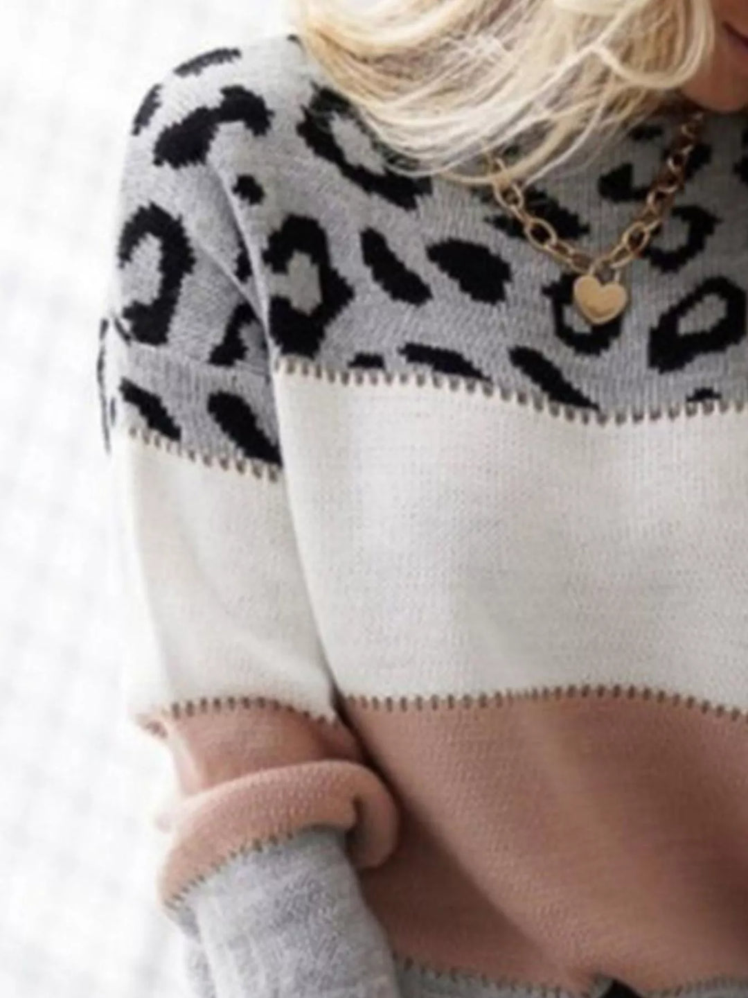 Long sleeve leopard top on hanger showing length
