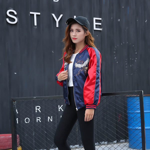 Back view of crane embroidery baseball coat in red

