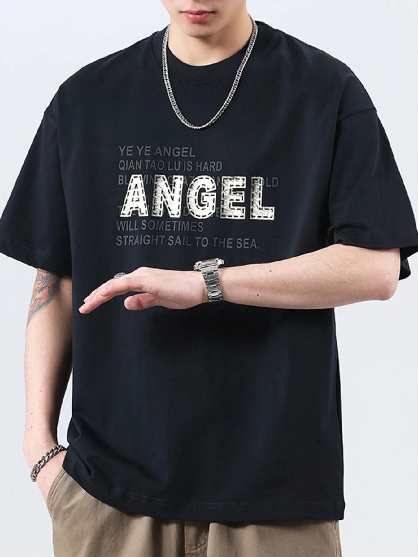 Men’s plus size t-shirt in white – clean letter graphic, airy knit, easy to style with jeans or joggers