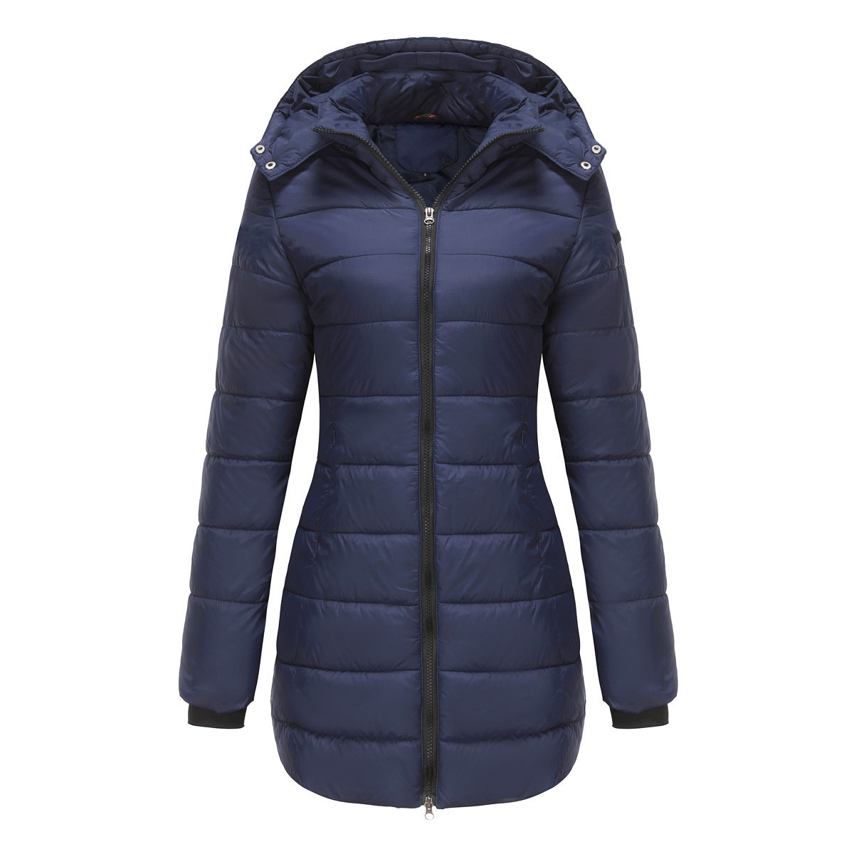 Model in black waterproof cotton-padded jacket on illuminated rooftop at dusk

