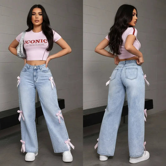 Model wearing bowknot collage washed women's jeans in urban setting with loose wide-leg vibe