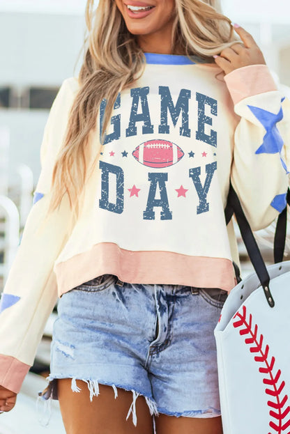 Model wearing game day sweatshirt showing full length relaxed silhouette and comfortable oversized design
