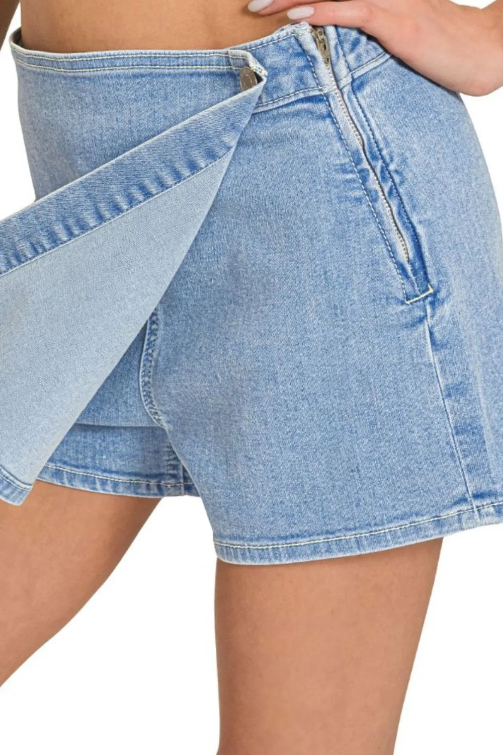 Model wearing size S – light blue wash pairs with any top

