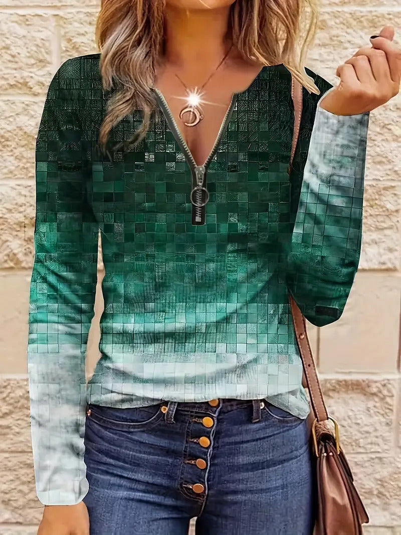 Model wearing the striped top styled with jeans – perfect fall layering.


