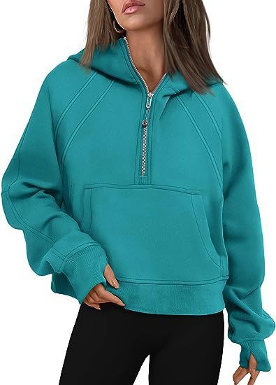 Light gray zip hoodie with side pockets and relaxed shoulders, shown on model

