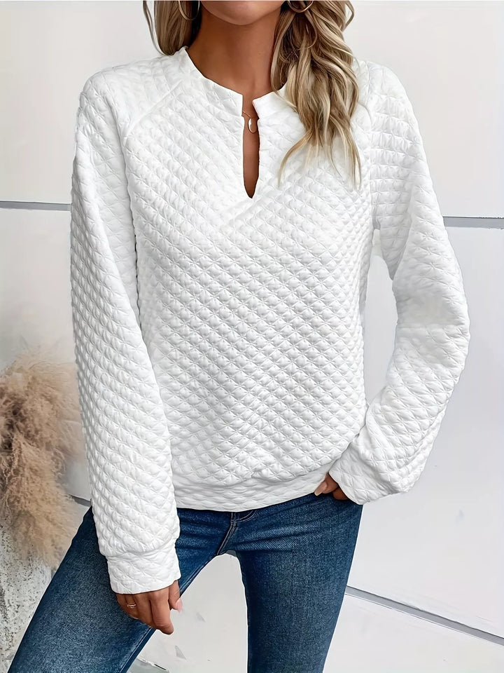 Notched sweatshirt neckline detail – women’s style