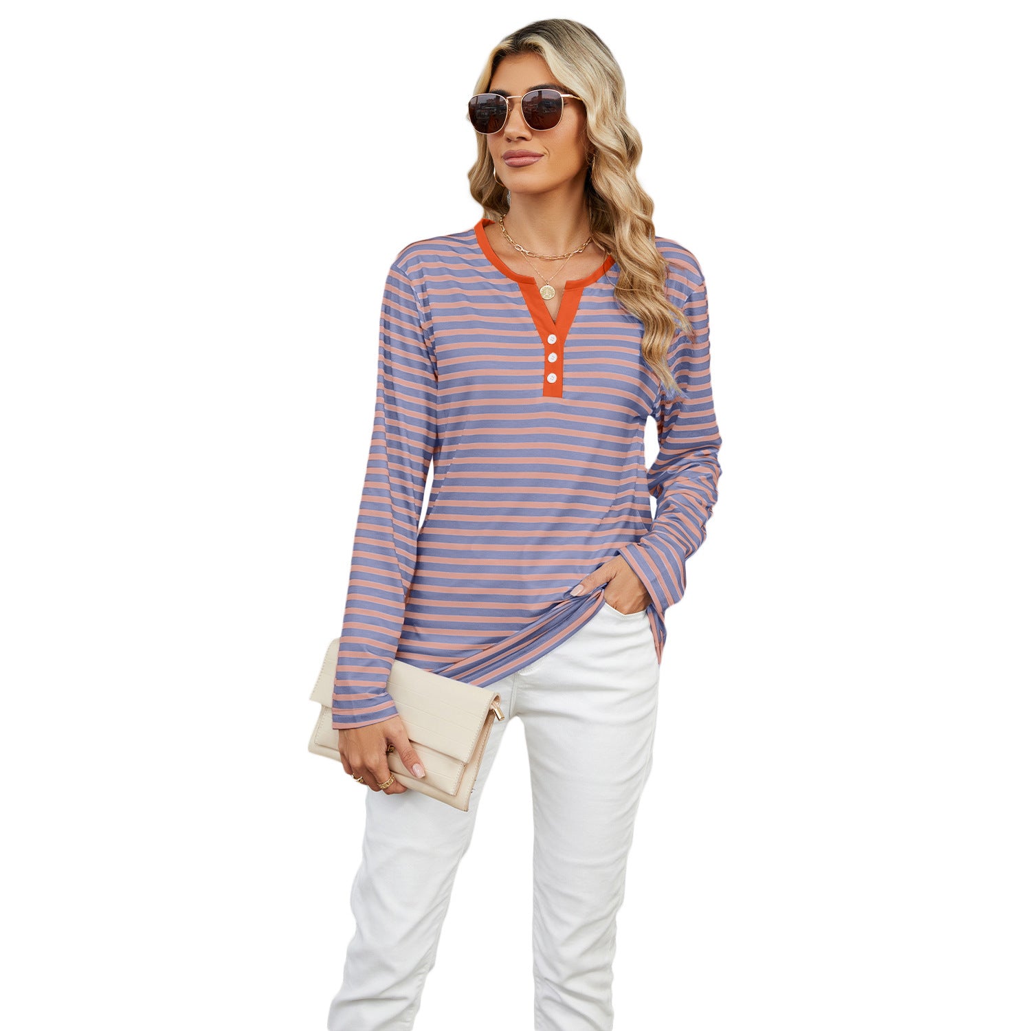 Our best-selling Striped V-neck T-shirt in green, a timeless piece that adds a pop of color to any modern wardrobe.

