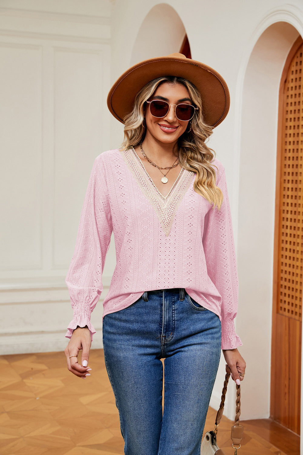 Pair with tailored trousers for the office - flounce adds just the right amount of drama.